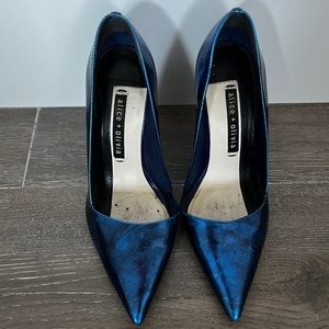 Super high metallic high heels by Alice & Olivia. True to size.